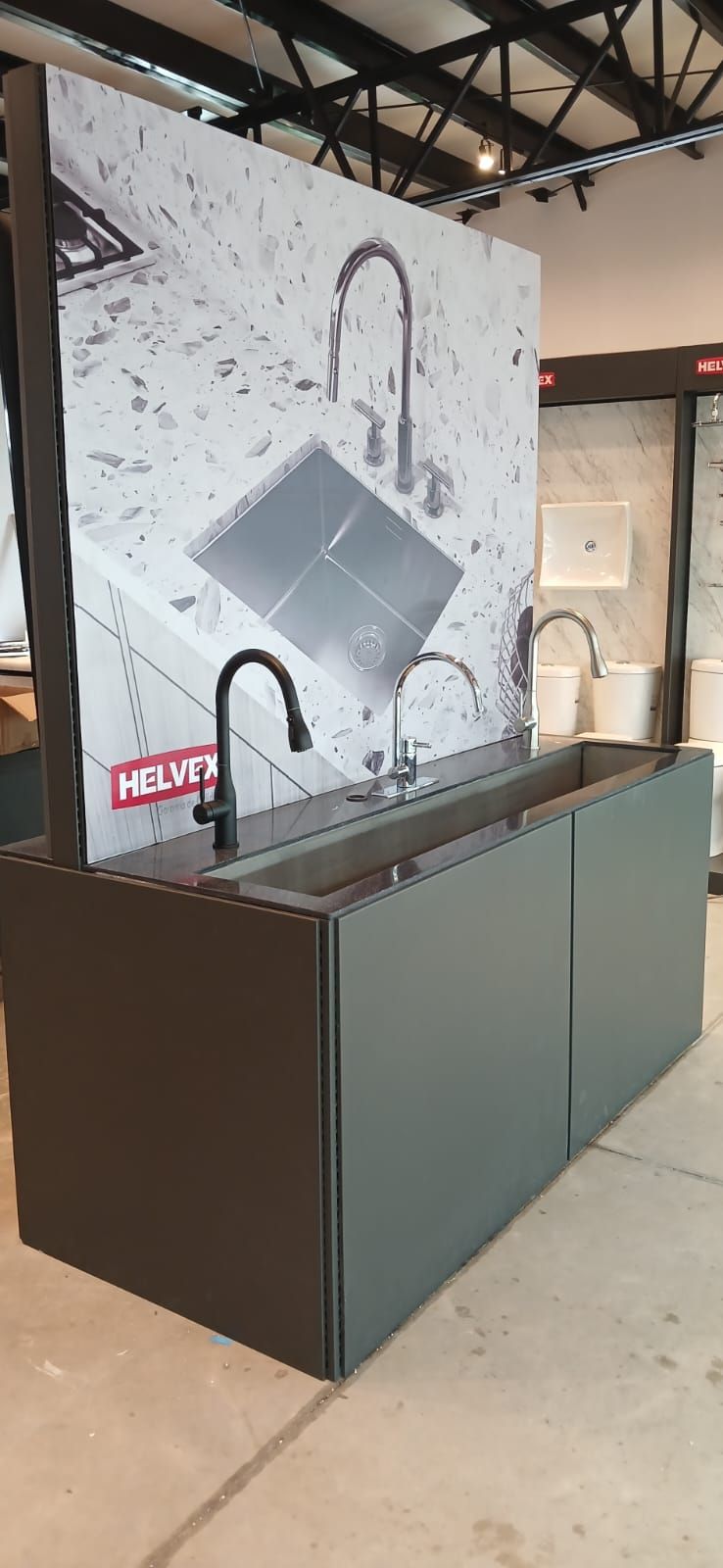 Display counter for kitchen sinks and faucets